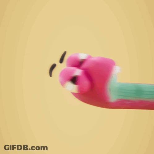 A Cartoon Worm With A Pink Face And Black Nose GIF