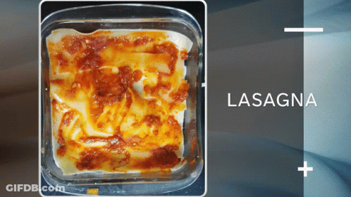 A Casserole Dish With Lasagna Written On The Top GIF