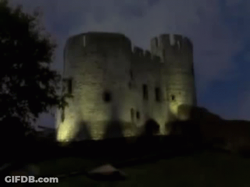 A Castle With The Words Castle Of Evil On The Bottom GIF