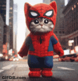 A Cat Dressed In A Spiderman Costume Is Walking Down The Street . GIF