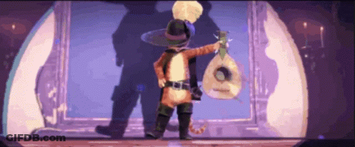 A Cat In A Cowboy Outfit Is Holding A Bag GIF