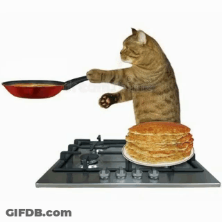 A Cat Is Cooking Pancakes On A Stove With A Stack Of Pancakes On A Plate . GIF