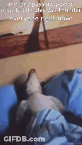 A Cat Is Laying On A Bed With A Caption That Says Hey Guys My Power Is Back Lets Play War Thunder Everyone Right Now . GIF