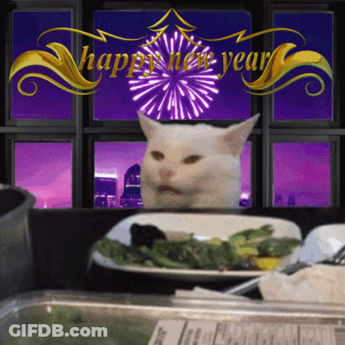 A Cat Is Looking Out A Window At Fireworks With The Words Happy New Year Above It GIF