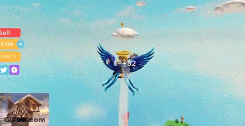 A Cat Is Playing A Video Game With A Bird On Top Of A Mountain . GIF