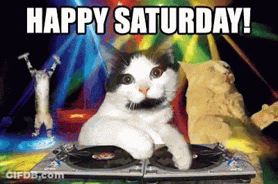 A Cat Is Sitting On A Turntable With The Words Happy Saturday In The Background GIF