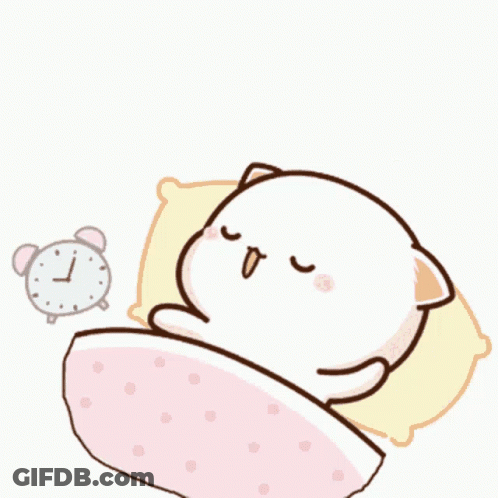 A Cat Is Sleeping In A Bed Next To An Alarm Clock . GIF