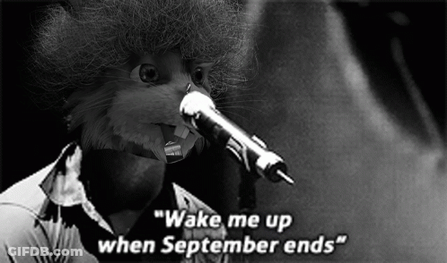 A Cat Singing Into A Microphone With The Words " Wake Me Up When September Ends " Below It GIF