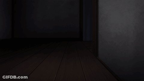 A Cat Standing Next To A Person With A Scarf Around His Neck GIF