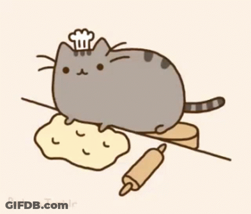 A Cat Wearing A Chef 'S Hat Is Laying On A Pile Of Dough GIF