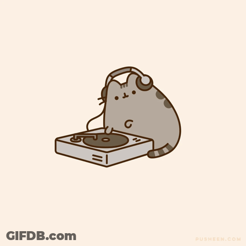 A Cat Wearing Headphones Is Playing A Record GIF