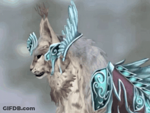 A Cat With A Crown On Its Head And Feathers Around Its Neck GIF