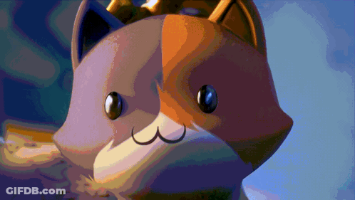 A Cat With A Crown On Its Head Is Looking At The Camera GIF