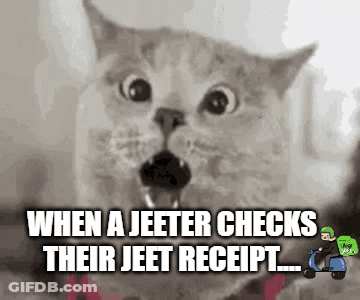 A Cat With A Surprised Look On Its Face Says When A Jeeter Checks Their Jeet Receipt .. GIF