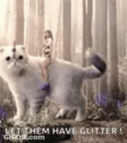 Cat With Unicorn Horn In Forest GIF