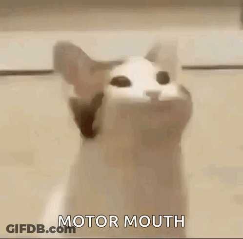 A Cat With Its Mouth Open And The Words `` Motor Mouth '' Written On Its Face . GIF