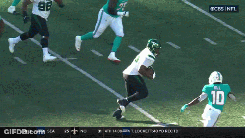 A Cbs NFL Broadcast Of A Football Game Between The New York Jets And The Miami Dolphins GIF