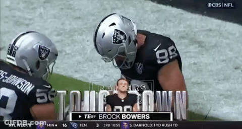 A Cbs Nfl Broadcast Of A Football Game Between The Raiders And Titans GIF