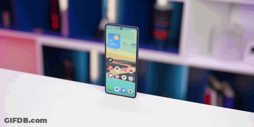A Cell Phone Displays The Time As 4:20 On The Screen GIF