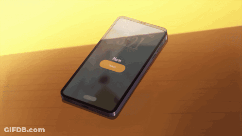 A Cell Phone Displays The Time As 5:21 GIF