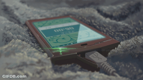 A Cell Phone Is Plugged Into A Charger And The Time Is 00:00 GIF