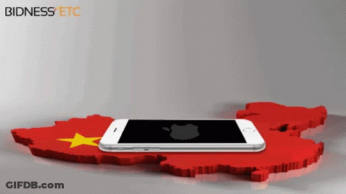 A Cell Phone Laying On Top Of A Red And Yellow Map With Bidness Etc Written On The Bottom GIF