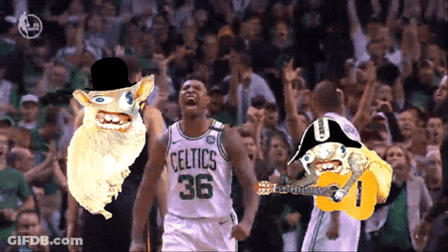 A Celtics Player Wearing A Top Hat And A Guitar Stands In Front Of A Crowd GIF