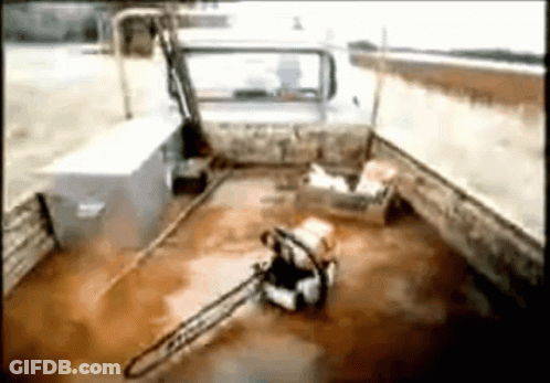 A Chainsaw Is Sitting In The Back Of A Car GIF