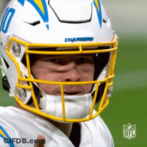 A Chargers Football Player Wearing A White Helmet GIF