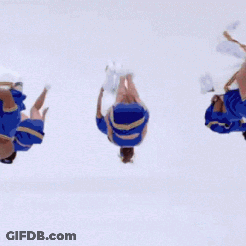 A Cheerleader Is Jumping In The Air With Her Arms Out GIF