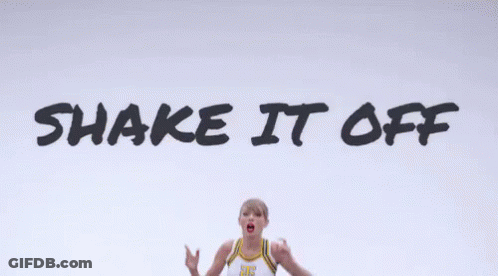 A Cheerleader Is Jumping In The Air With The Words Shake It Off In The Background GIF