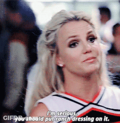 A Cheerleader Says " I 'M Serious " And " You Should Put Ranch Dressing On It " GIF