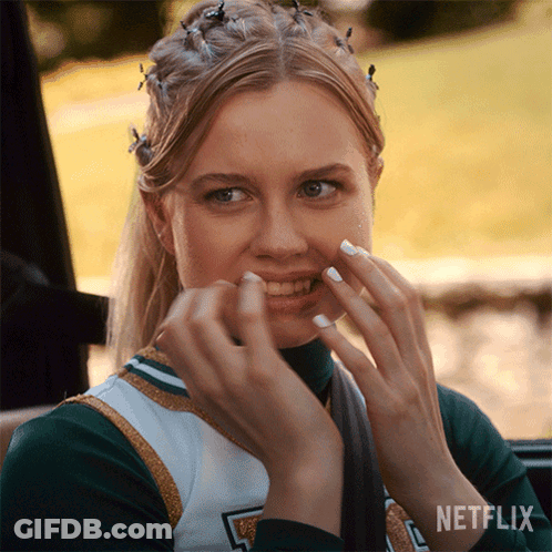 A Cheerleader With Netflix Written On The Bottom Right GIF