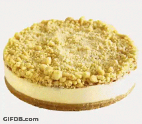 A Cheesecake With A Crumb Topping On Top Of It GIF