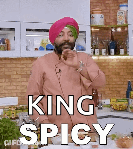 A Chef With A Turban On Says King Spicy In A Kitchen . GIF
