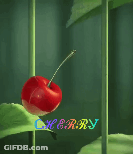 A Cherry Is On A Green Leaf With The Word Cherry Behind It GIF