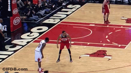 A Chicago Bulls Basketball Player Stands On The Court GIF