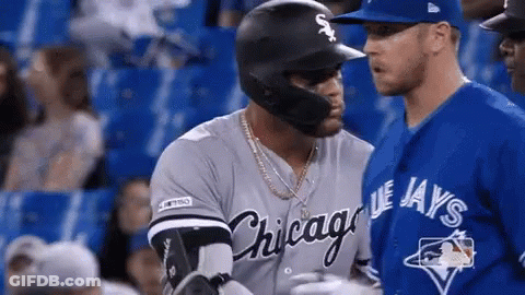 A Chicago White Sox Baseball Player Talks To A Blue Jays Baseball Player GIF