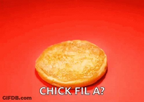 A Chick Fil A Sandwich Is On A Red Background GIF