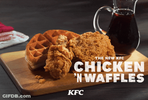 A Chicken And Waffle On A Cutting Board That Says Chicken N Waffles GIF