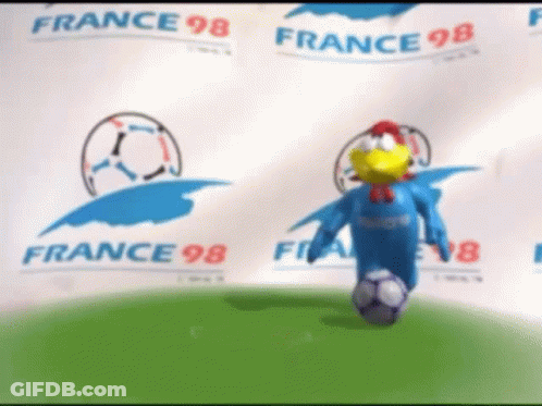 A Chicken Mascot Is Kicking A Soccer Ball In Front Of A Banner That Says France 98 GIF