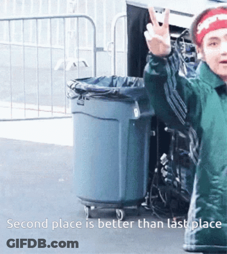 A Child Giving A Peace Sign With The Words Second Place Is Better Than Last Place GIF