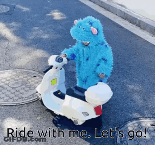 A Child In A Monsters Inc Costume Is Riding A Toy Scooter With The Caption Ride With Me Let 'S Go GIF