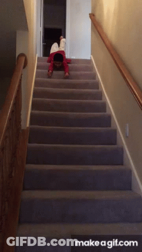 A Child Is Crawling Up A Set Of Stairs With Make A Gif.com In The Bottom Right Corner GIF