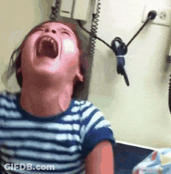 A Child Is Screaming With His Mouth Wide Open GIF