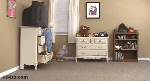 A Child 'S Room With A Tv And A Dresser GIF
