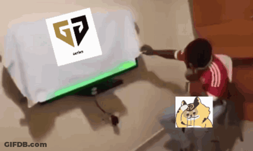 A Child Sitting In Front Of A Television With A Gp Logo On It GIF