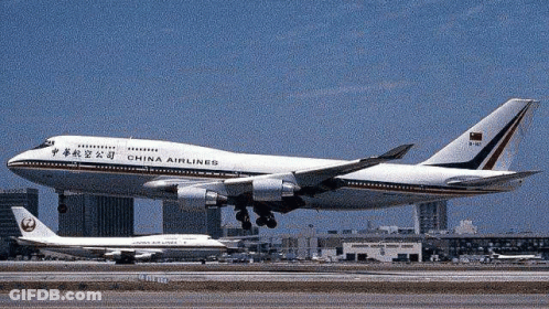 A China Airlines Airplane Is Taking Off From An Airport Runway GIF