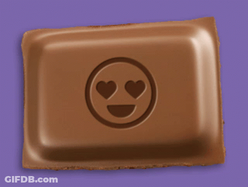 A Chocolate Bar With A Smiling Face And Heart Eyes GIF