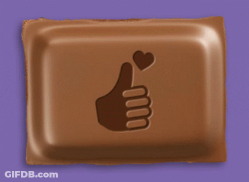A Chocolate Bar With A Thumbs Up Sign And A Heart On It GIF